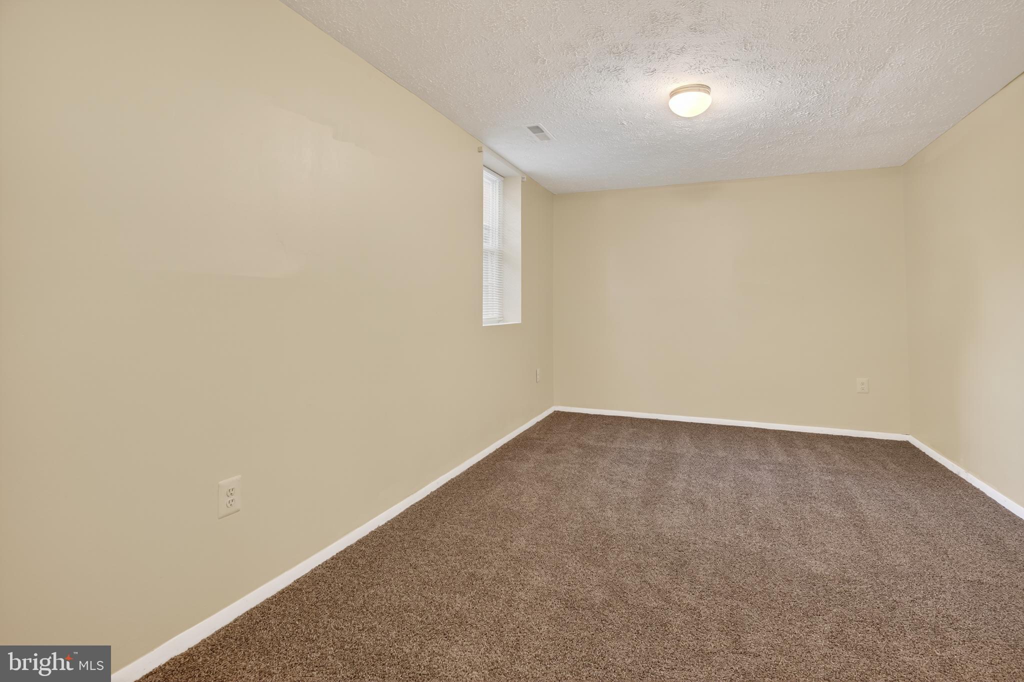 18314 Hallmark Court Gaithersburg, MD 20879 - Photo 13 of 26 a view of an empty room