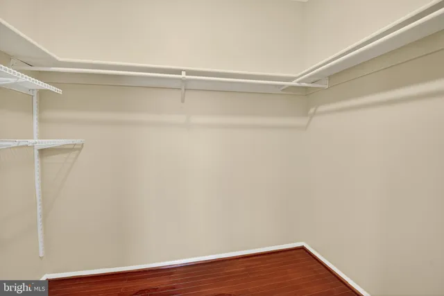 a view of an empty walk in closet