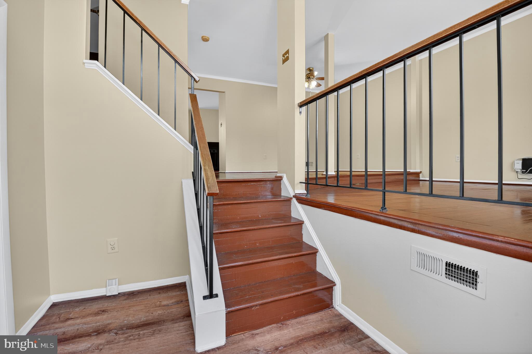 18314 Hallmark Court Gaithersburg, MD 20879 - Photo 2 of 26 a view of entryway and hall with wooden floor