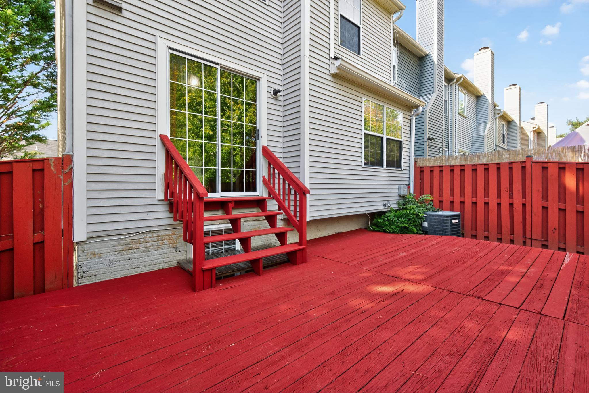 18314 Hallmark Court Gaithersburg, MD 20879 - Photo 24 of 26 a backyard of a house with seating space