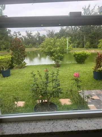 a view of a lake from a balcony