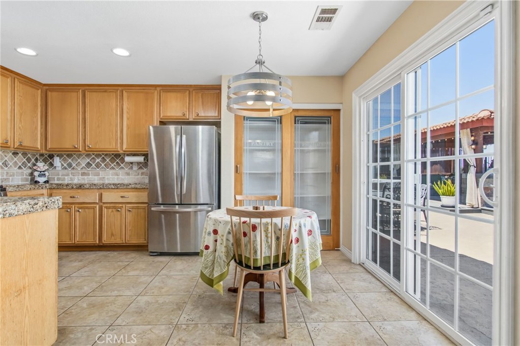 29341 Wildcat Canyon Road Menifee, CA 92587 - Photo 11 of 36 Breakfast Nook *Fridge was added Virtually*