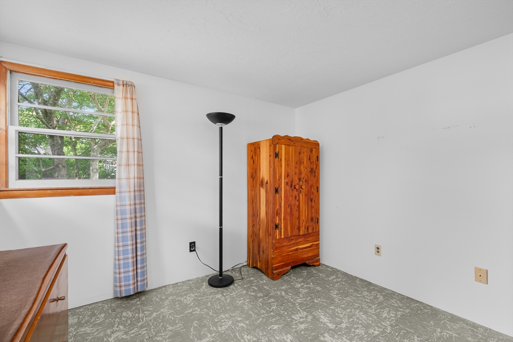 64 Uncle Percy's Road Mashpee, MA 02649 - Photo 18 of 33 an empty room with windows