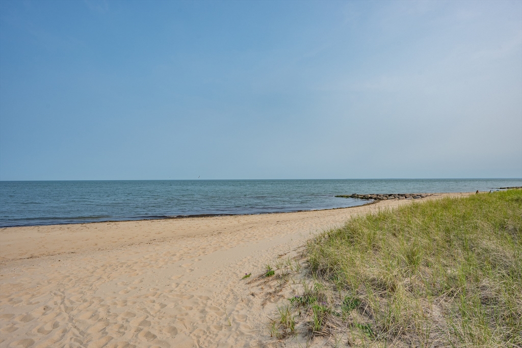 64 Uncle Percy's Road Mashpee, MA 02649 - Photo 30 of 33 a view of an empty room and lake view
