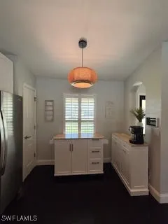 a kitchen with stainless steel appliances a stove a sink and a refrigerator