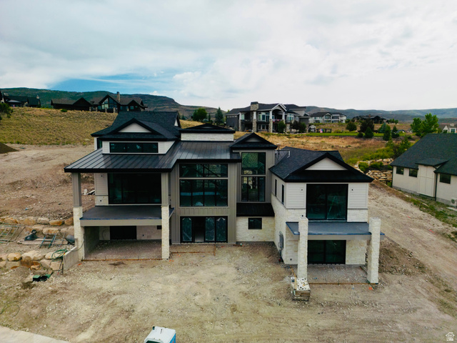 3101 Hunters Ridge Way Heber City, UT 84032 - Photo 6 of 17 Contemporary new construction featuring a multi-level design with a stone and siding exterior