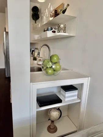 a close view of shoes and cabinets in a room
