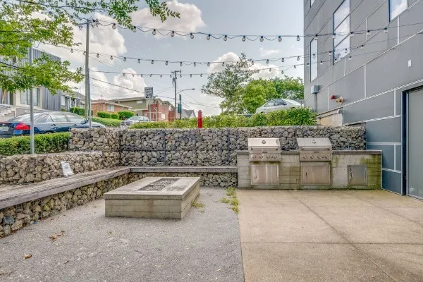 a view of a patio with couches table and chairs
