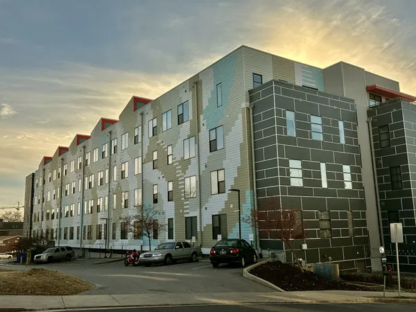 a view of a building with a street