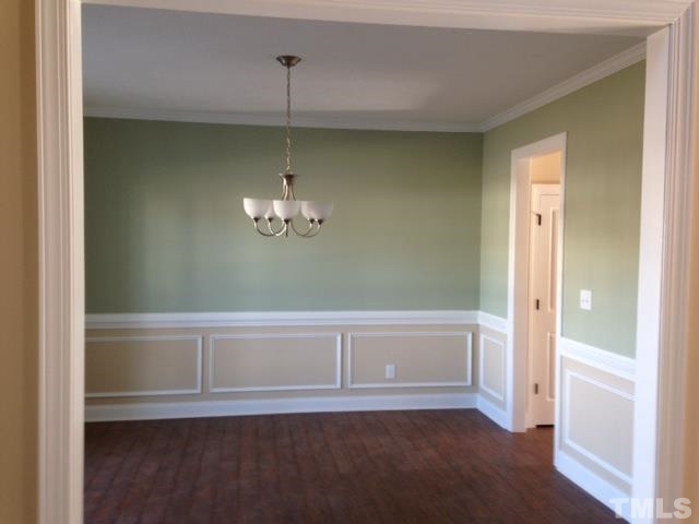 154 Culpepper Road Cameron, NC 28326 - Photo 2 of 25 a view of empty room with wooden floor and fan