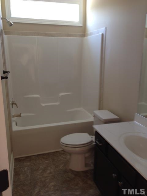 154 Culpepper Road Cameron, NC 28326 - Photo 11 of 25 a bathroom with a sink a toilet and a bathtub