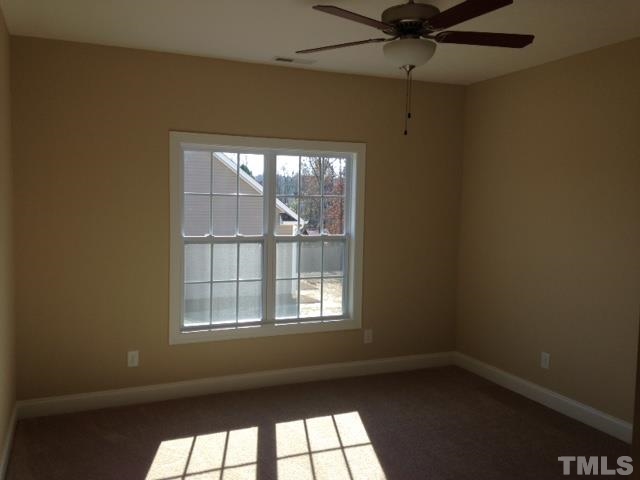 154 Culpepper Road Cameron, NC 28326 - Photo 12 of 25 an empty room with a window