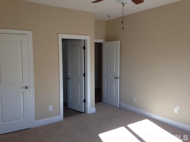 154 Culpepper Road Cameron, NC 28326 - Photo 13 of 25 a view of an empty room with closet and a window