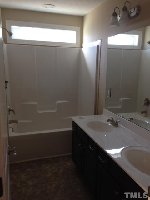 154 Culpepper Road Cameron, NC 28326 - Photo 18 of 25 a bathroom with a sink and a mirror