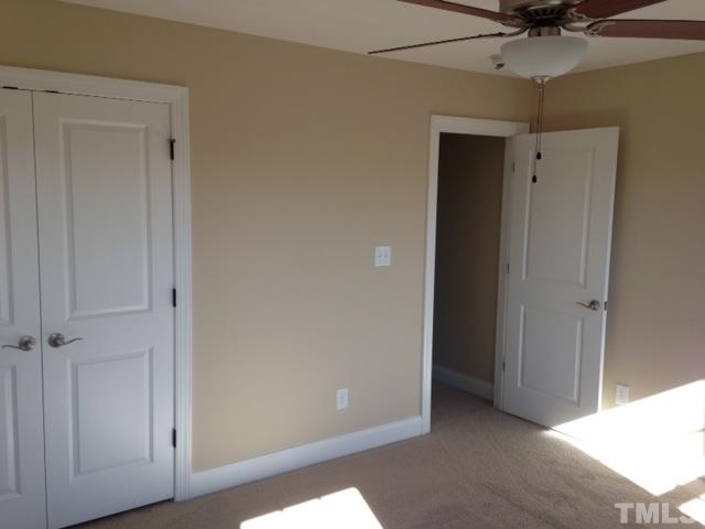 154 Culpepper Road Cameron, NC 28326 - Photo 20 of 25 a view of a livingroom with a ceiling fan & entryway