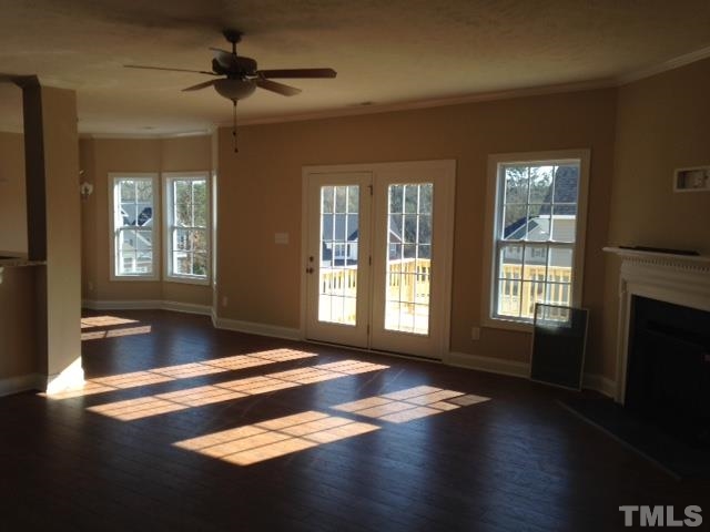 154 Culpepper Road Cameron, NC 28326 - Photo 9 of 25 a view of an empty room with wooden floor and a window