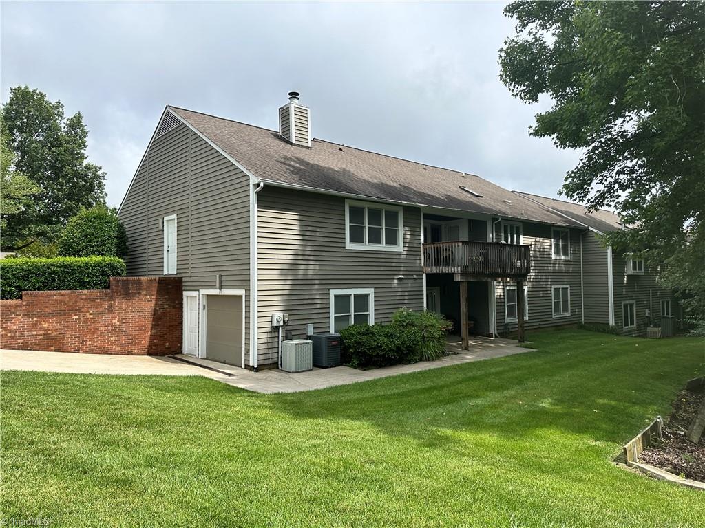 Rear view showing extra garage & private entrance