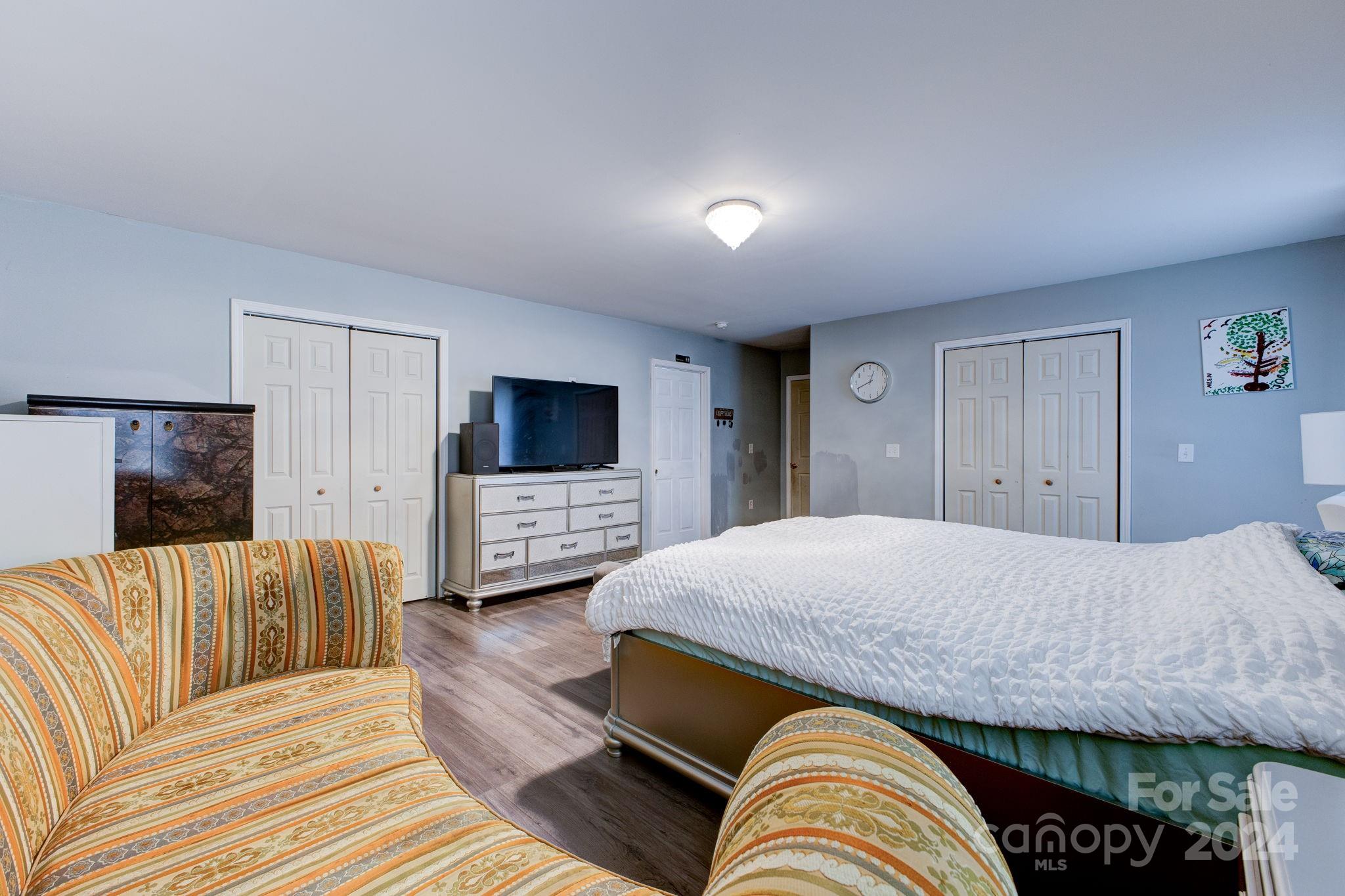 1204 Coventry Place Northwest Conover, NC 28613 - Photo 17 of 17 a bedroom with a bed and a couch