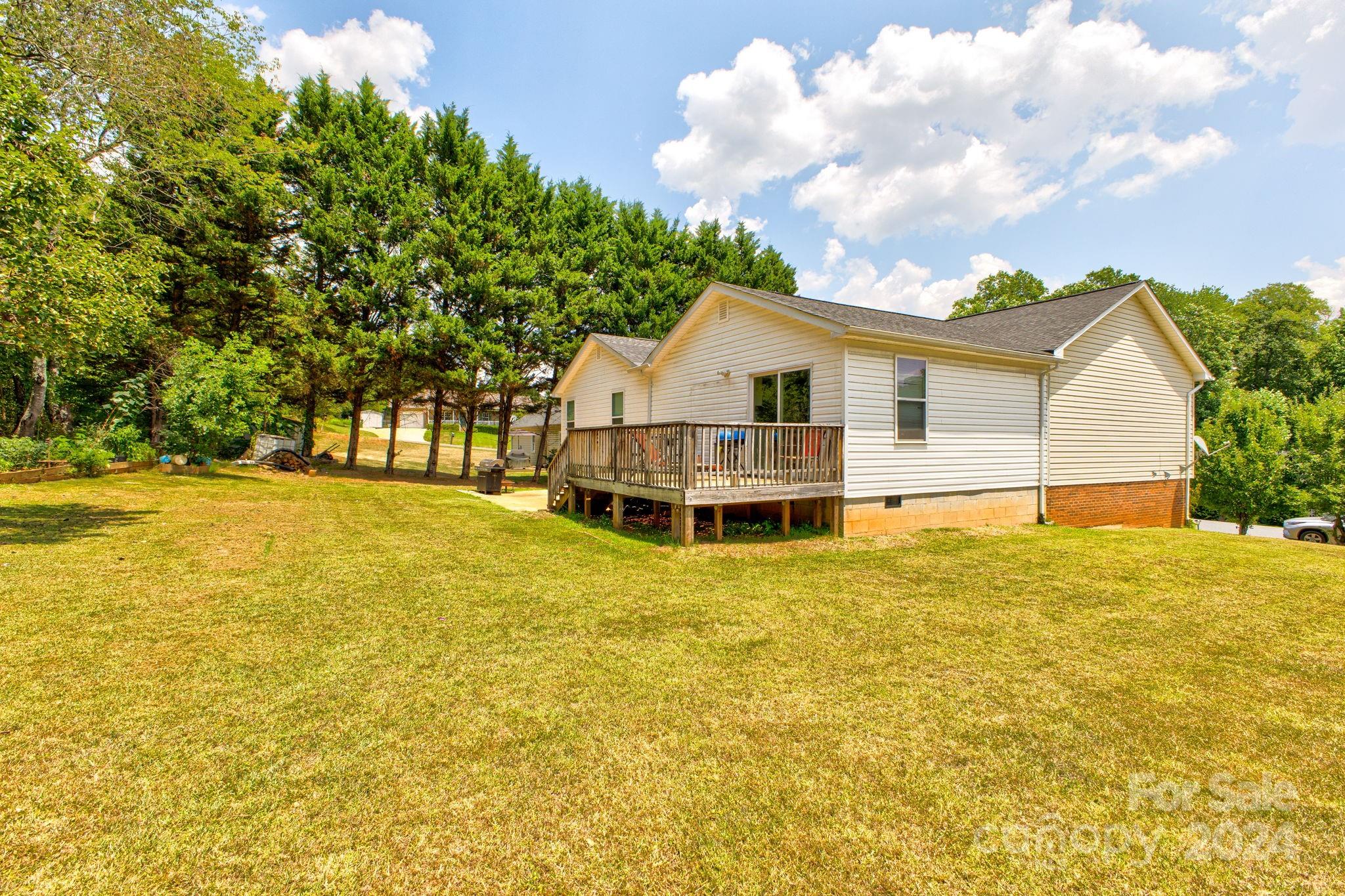 1204 Coventry Place Northwest Conover, NC 28613 - Photo 2 of 17 a view of a house with a swimming pool