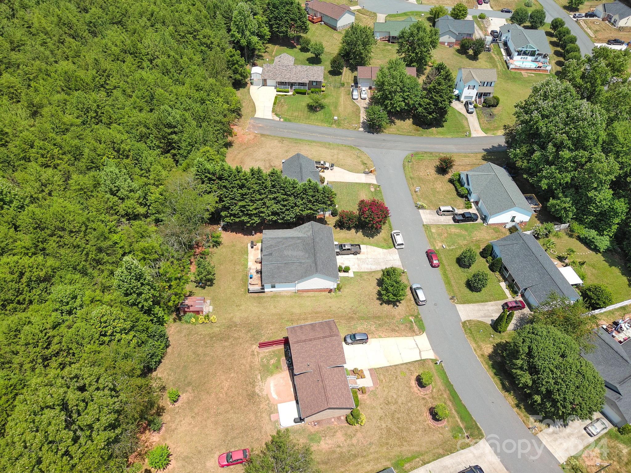 1204 Coventry Place Northwest Conover, NC 28613 - Photo 3 of 17 an aerial view of residential houses with outdoor space