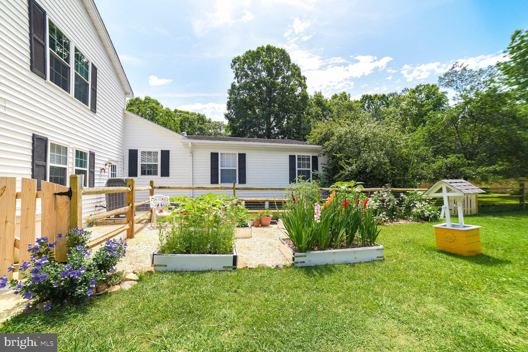 22571 Bull Road Leonardtown, MD 20650 - Photo 48 of 67 Lovely Back Yard with Raised Flower Beds