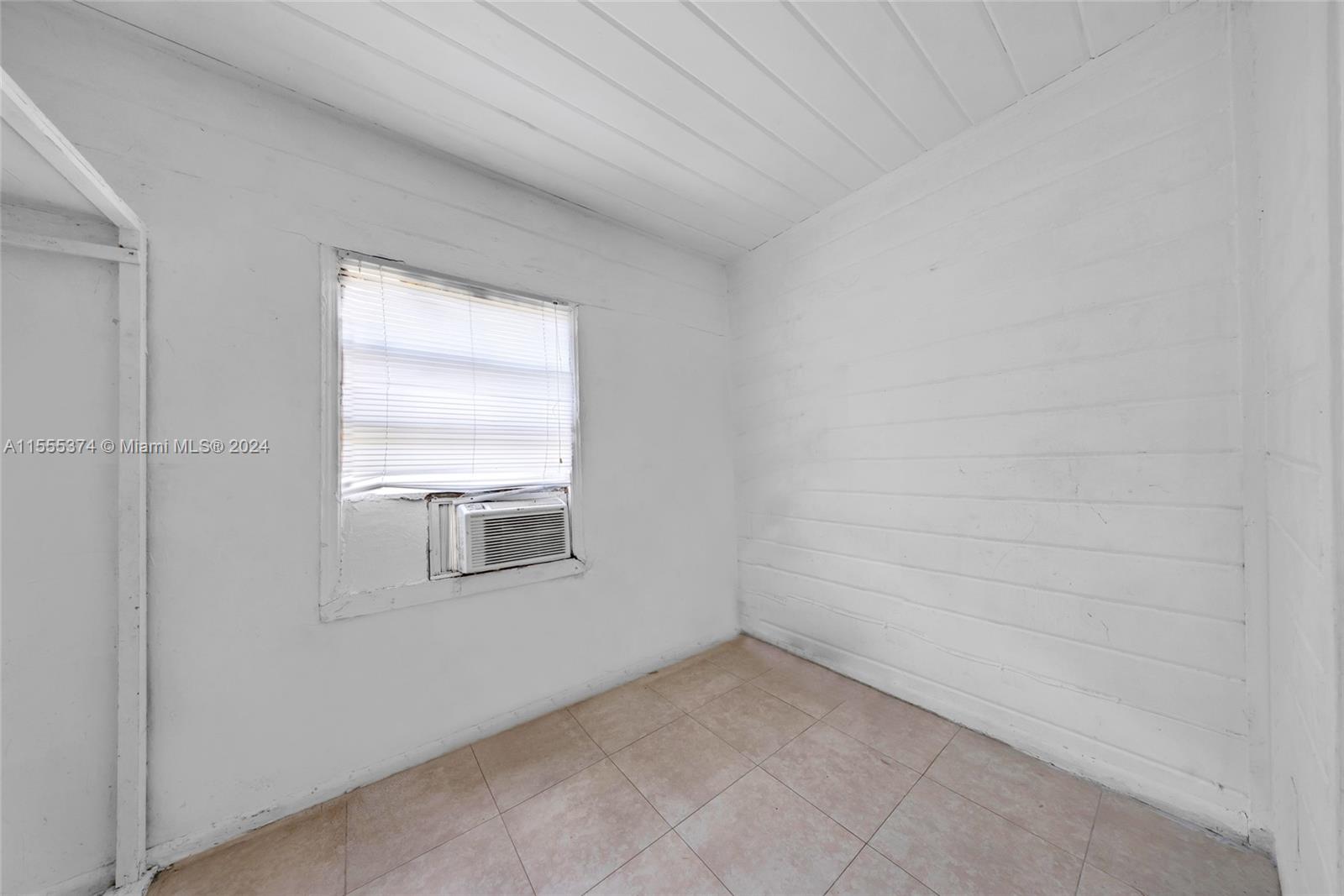 2728 Northwest 3rd Street Miami, FL 33125 - Photo 25 of 33 a view of a window in an empty room