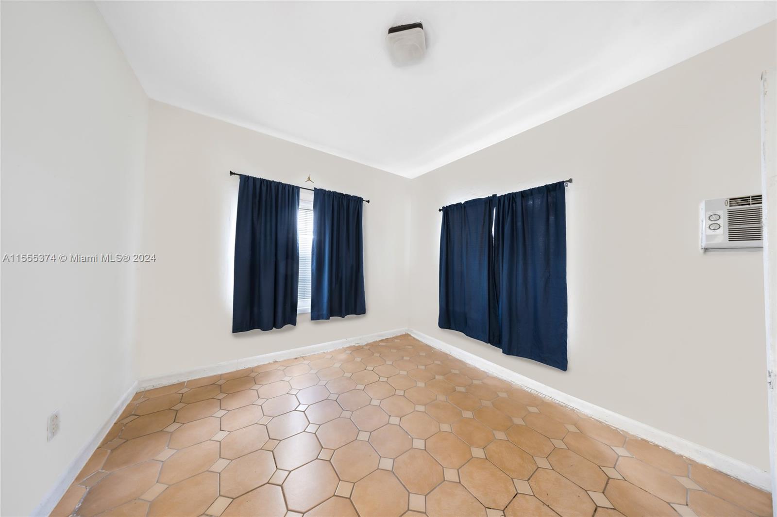 2728 Northwest 3rd Street Miami, FL 33125 - Photo 32 of 33 a view of an empty room with closet