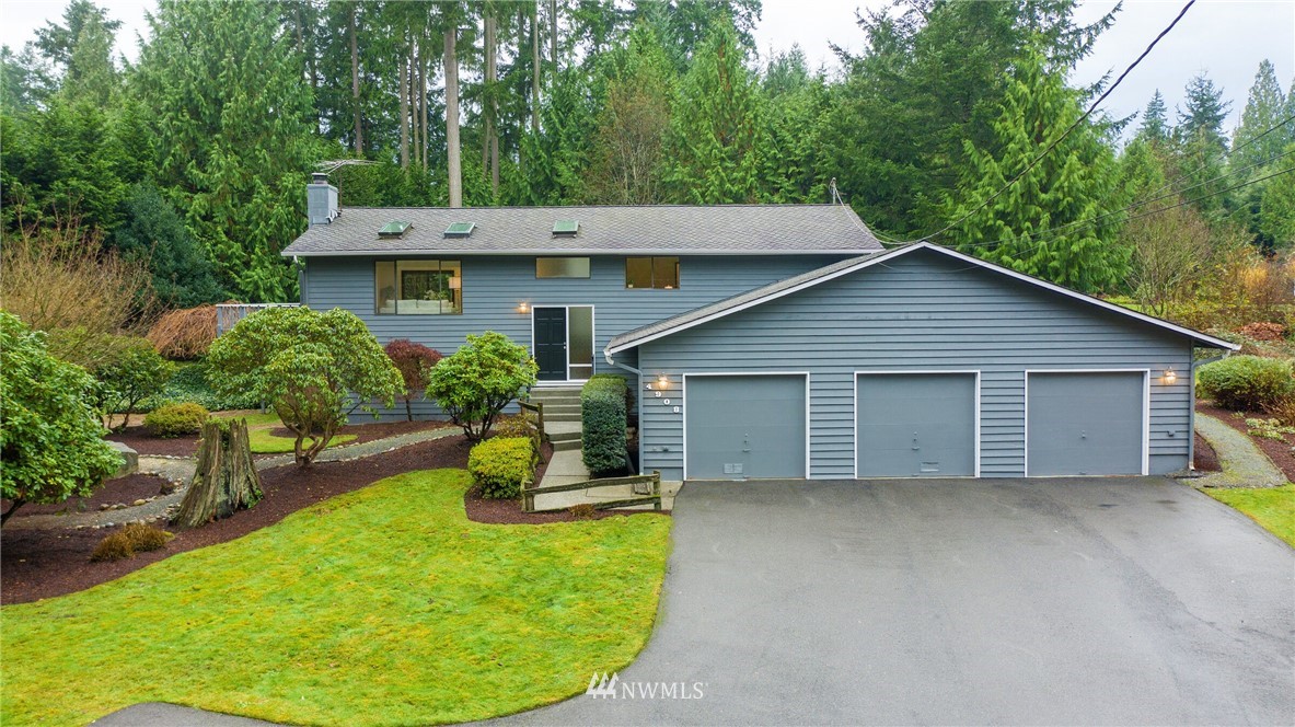 4908 200th Street Southeast Bothell, WA 98012 - Photo 1 of 29 a view of a house with a yard patio and sitting area