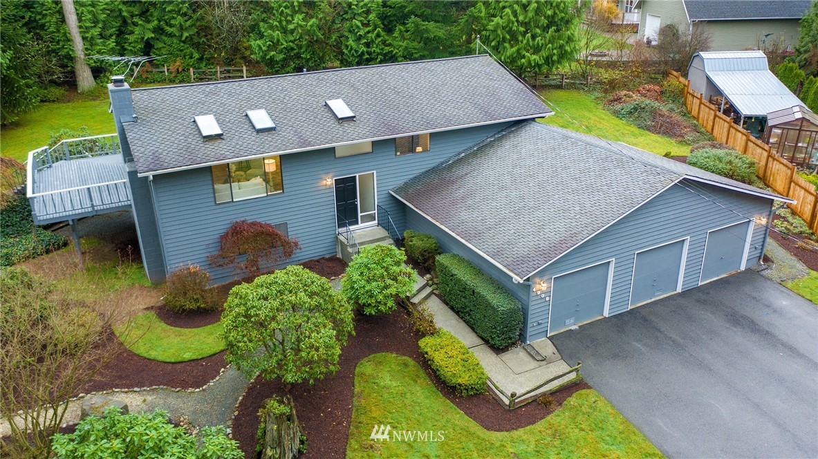 4908 200th Street Southeast Bothell, WA 98012 - Photo 3 of 29 front view of house with a yard