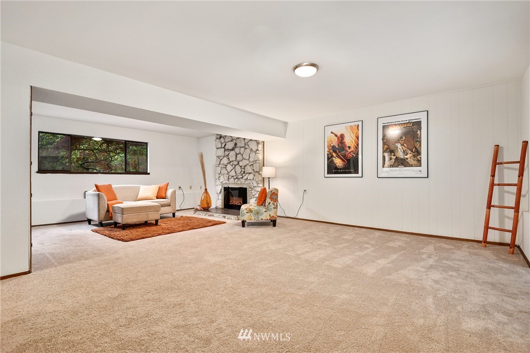 4908 200th Street Southeast Bothell, WA 98012 - Photo 23 of 29 a view of a livingroom with furniture and a window