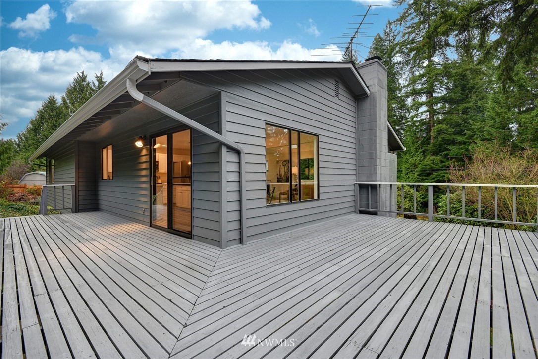 4908 200th Street Southeast Bothell, WA 98012 - Photo 24 of 29 a view of a house with wooden deck