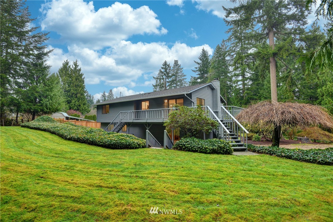 4908 200th Street Southeast Bothell, WA 98012 - Photo 28 of 29 a view of a house with backyard and garden