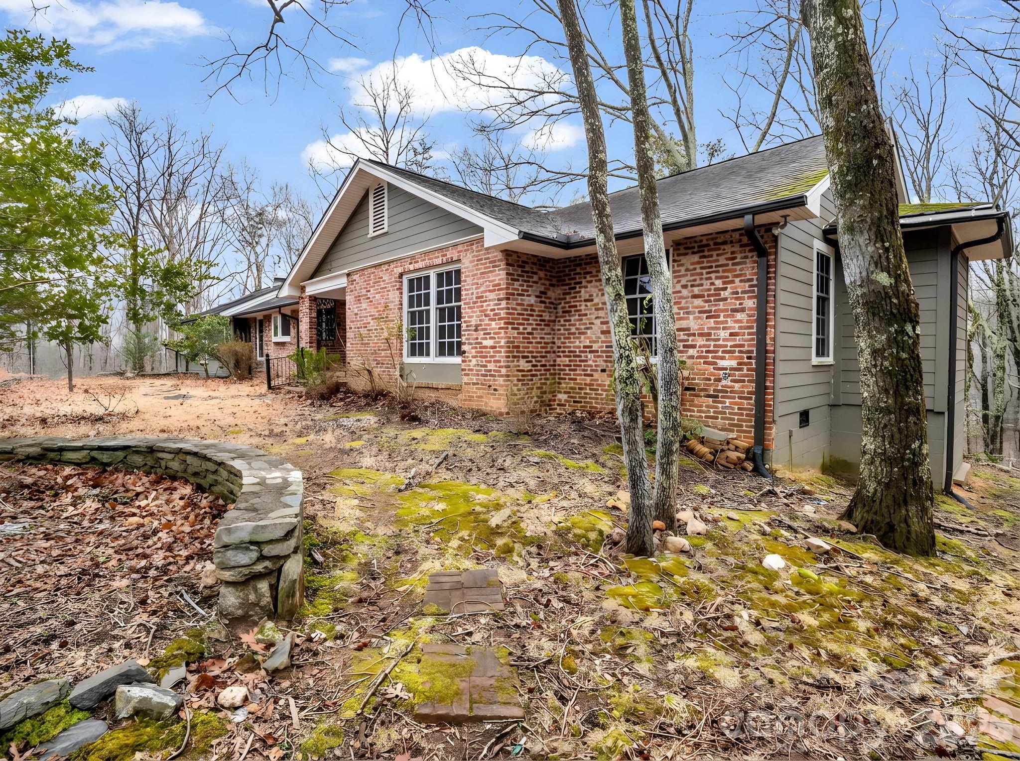 117 Hummingbird Lane Columbus, NC 28722 - Photo 2 of 32 a backyard of a house