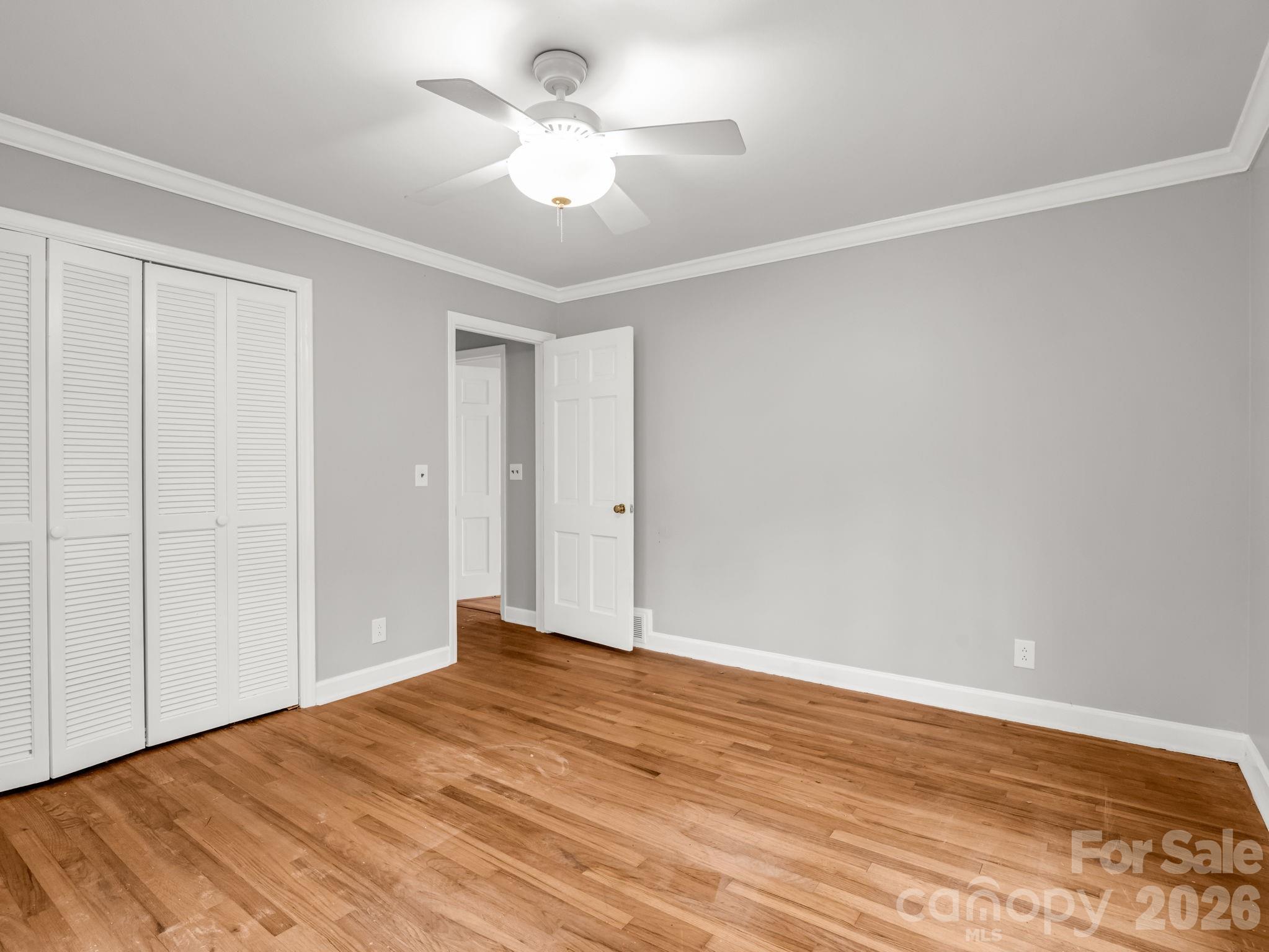 117 Hummingbird Lane Columbus, NC 28722 - Photo 23 of 32 a view of empty room with wooden floor