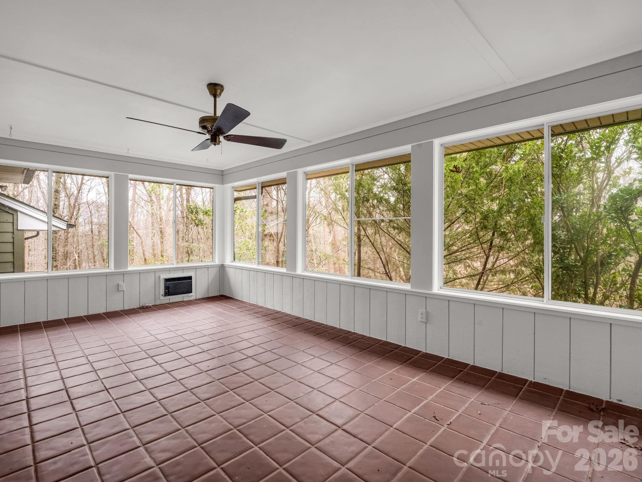 117 Hummingbird Lane Columbus, NC 28722 - Photo 28 of 32 a view of an empty room with a window
