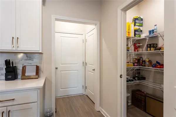 a view of a kitchen with appliances