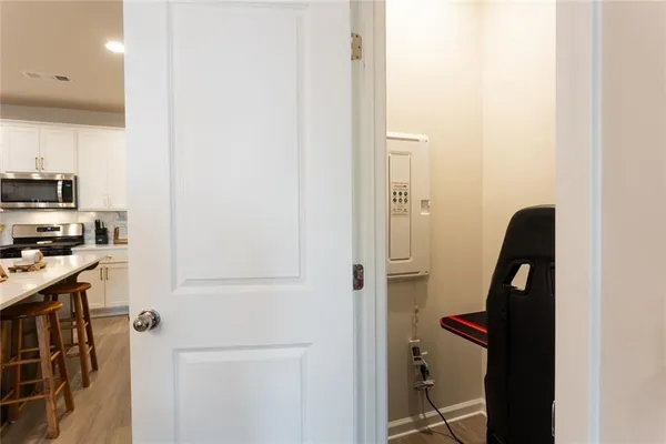 a bathroom with a sink a mirror and vanity
