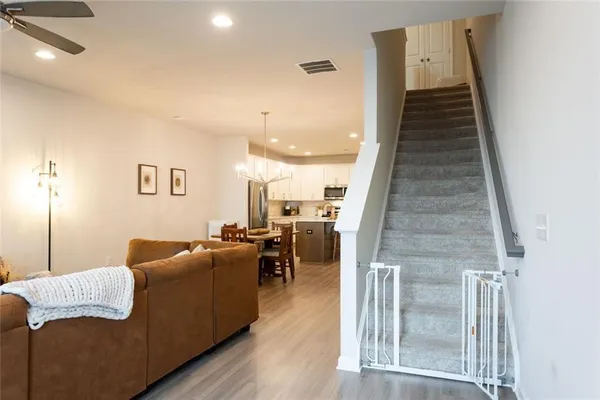 a bedroom with a bed and large window