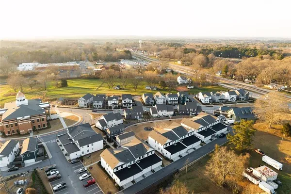 a water view of a multi story residential apartment building
