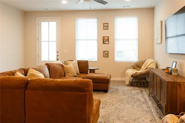 a living room with furniture and a window