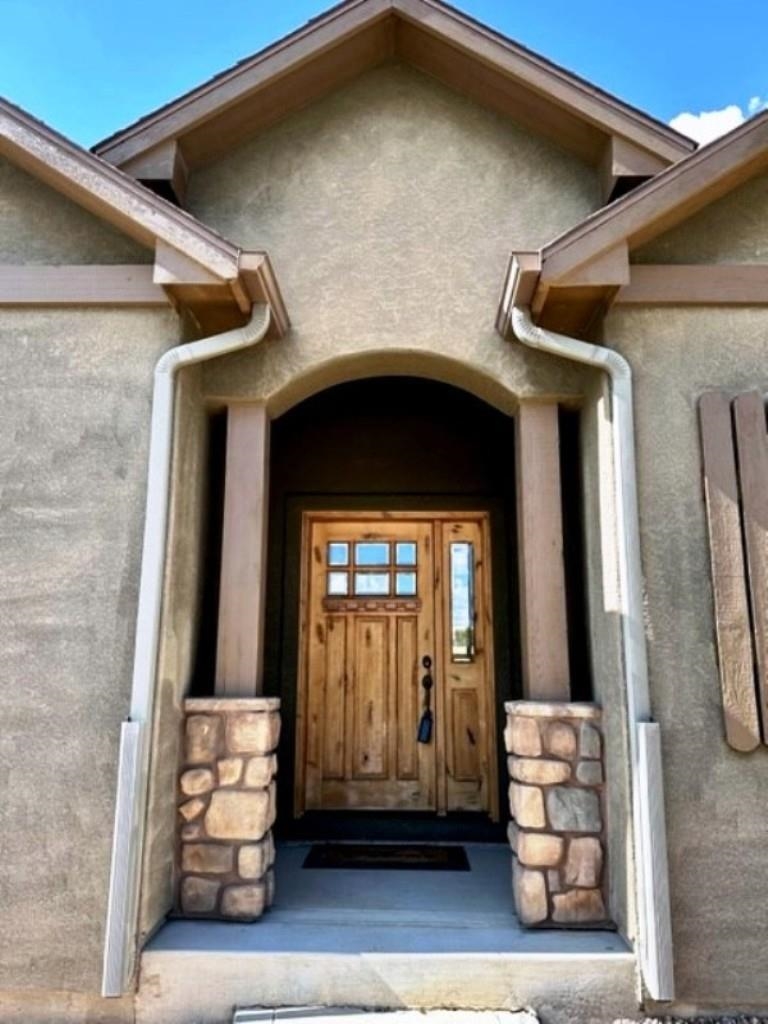 800 Esprit Lane Fruita, CO 81521 - Photo 3 of 38 a view of front door of a house