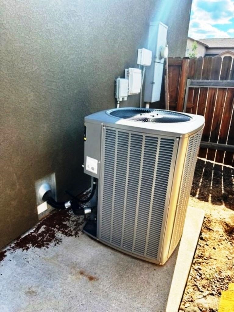 800 Esprit Lane Fruita, CO 81521 - Photo 34 of 38 a very nice looking dining room with a fireplace