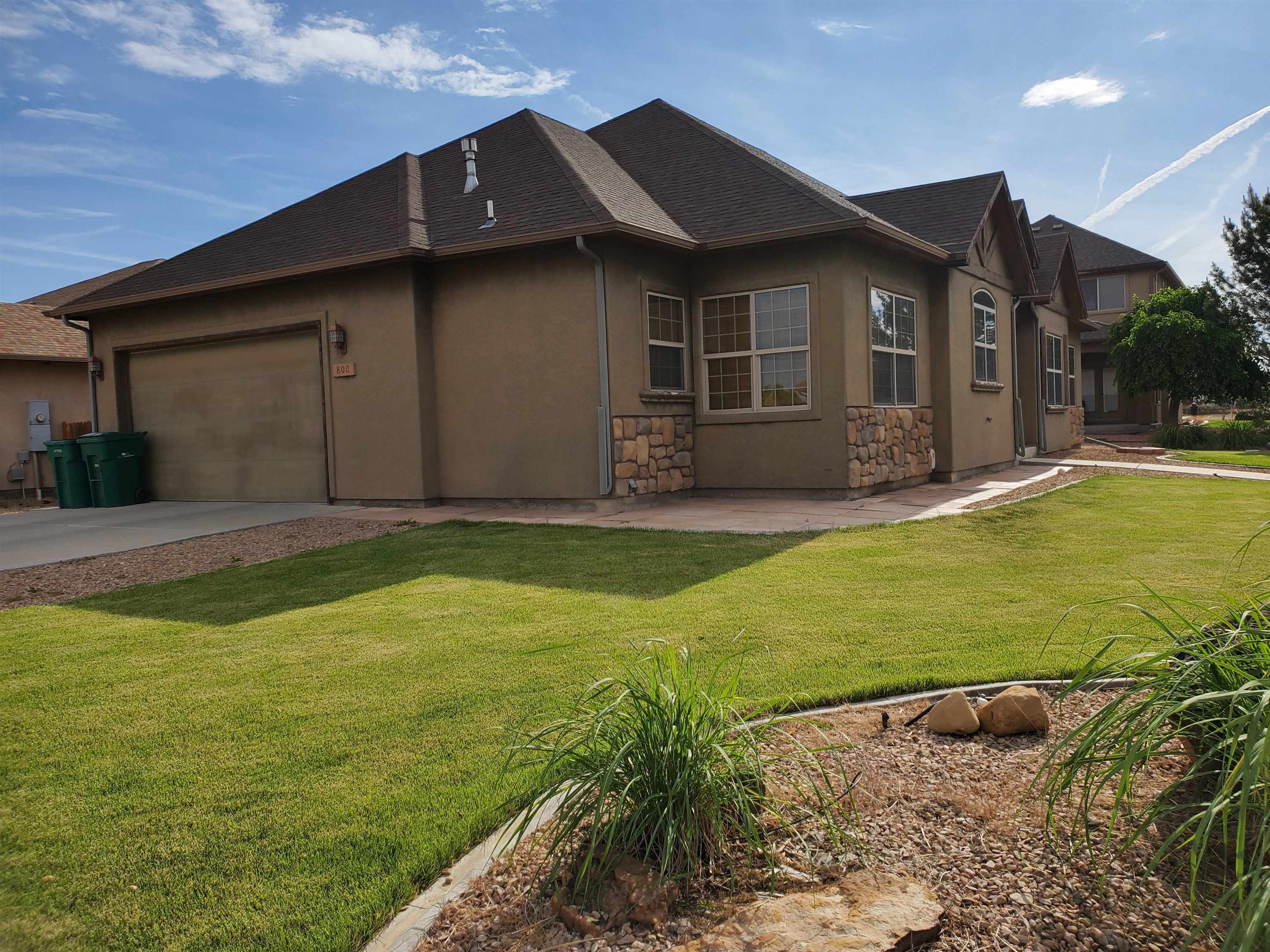 800 Esprit Lane Fruita, CO 81521 - Photo 35 of 38 a house view with a garden space