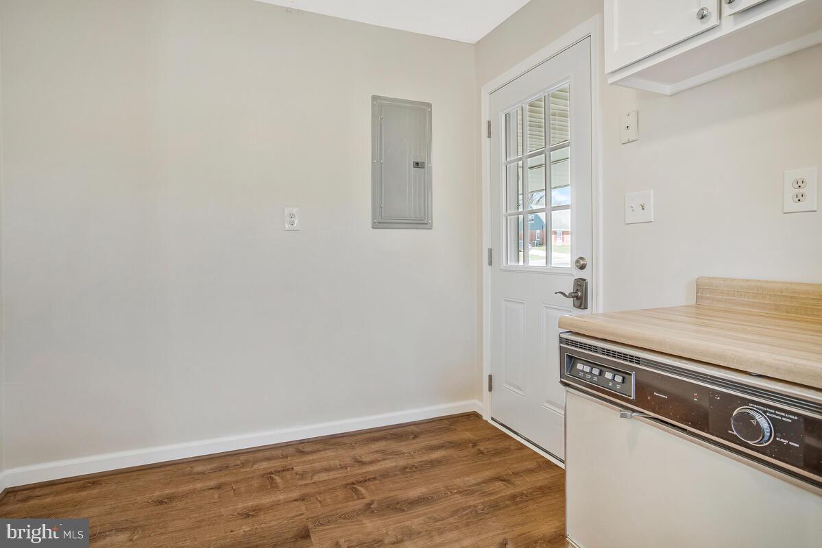 830 Joppa Farm Road Joppa, MD 21085 - Photo 16 of 41 a view of an empty room with wooden floor and a window