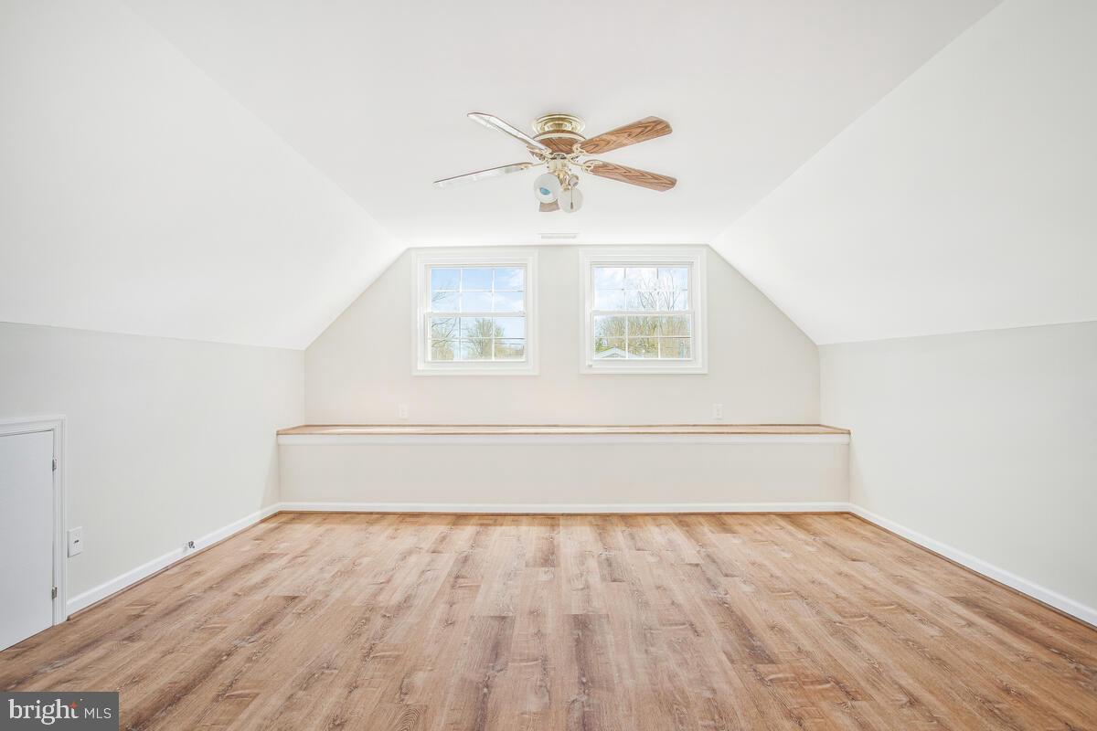 830 Joppa Farm Road Joppa, MD 21085 - Photo 28 of 41 a view of an empty room with wooden floor and a window