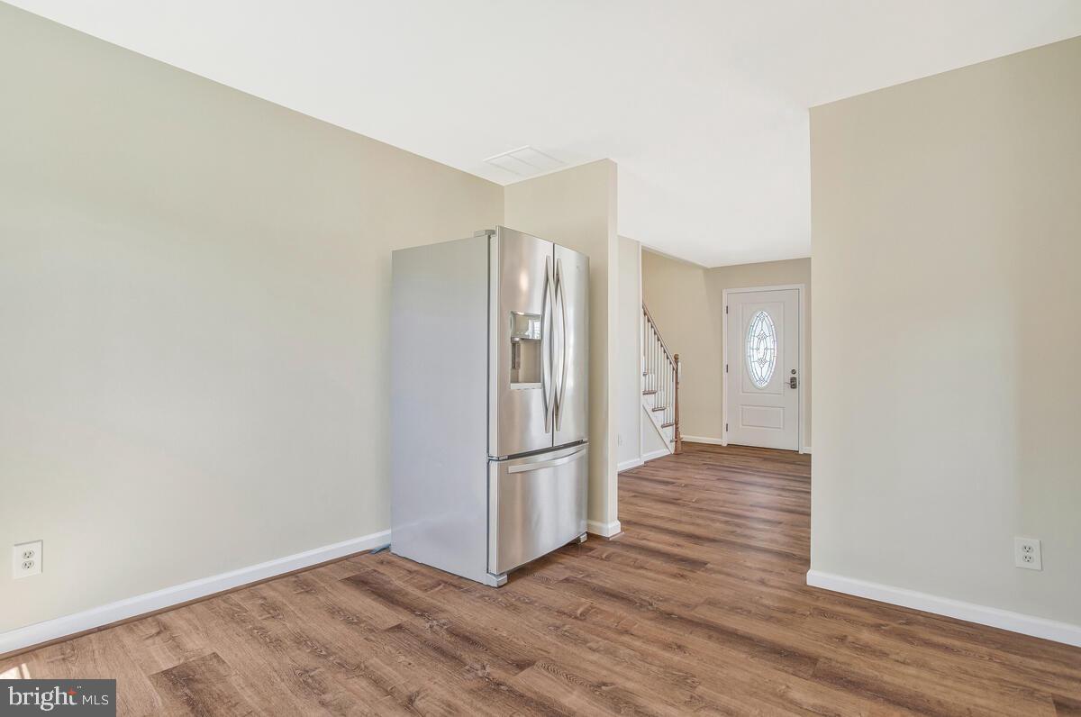 830 Joppa Farm Road Joppa, MD 21085 - Photo 9 of 41 a view of wooden floor in an empty room