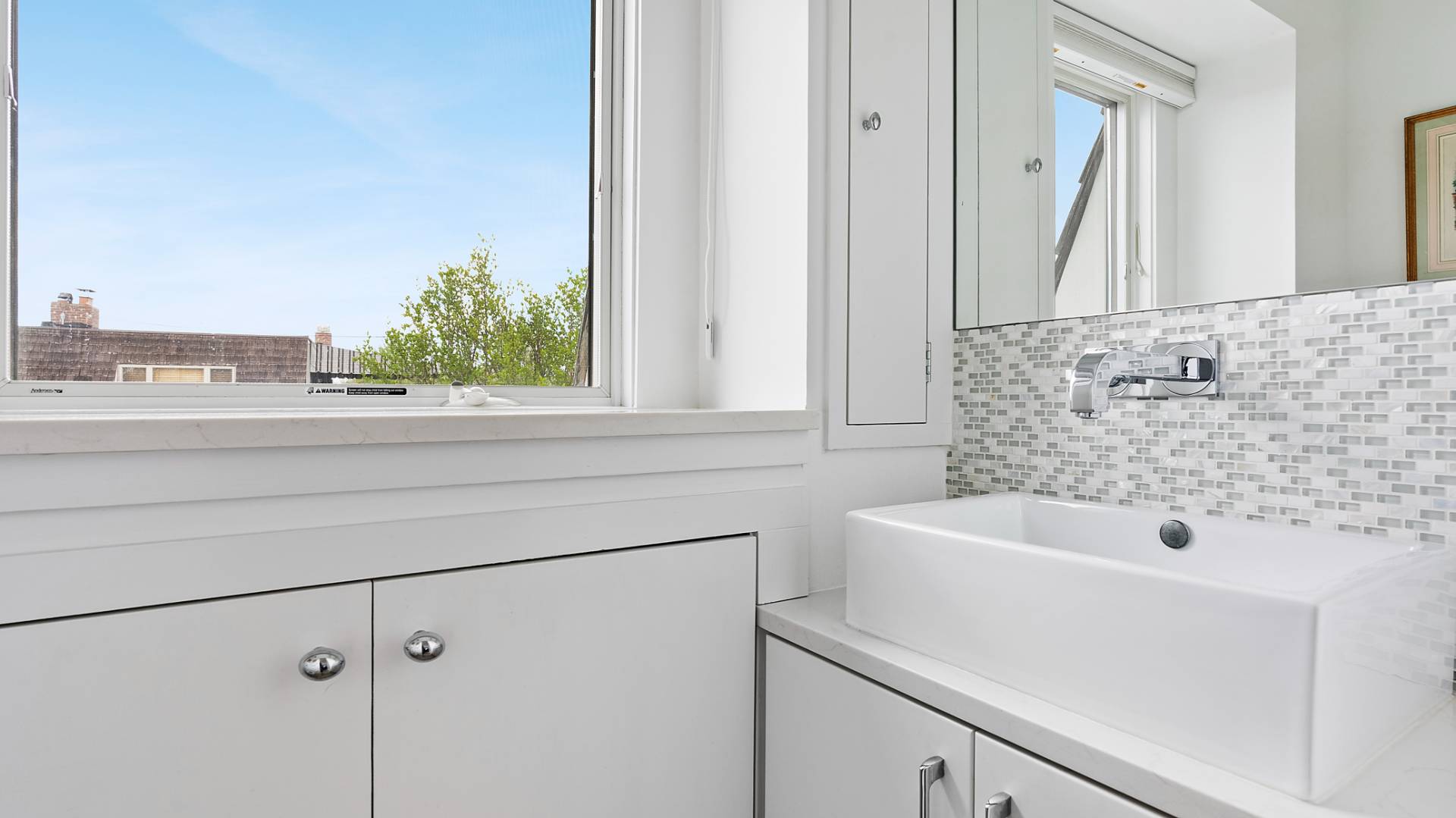 18 Bridge Street, Unit 4D Sag Harbor, NY 11963 - Photo 11 of 16 a bathroom with a sink and a bathtub