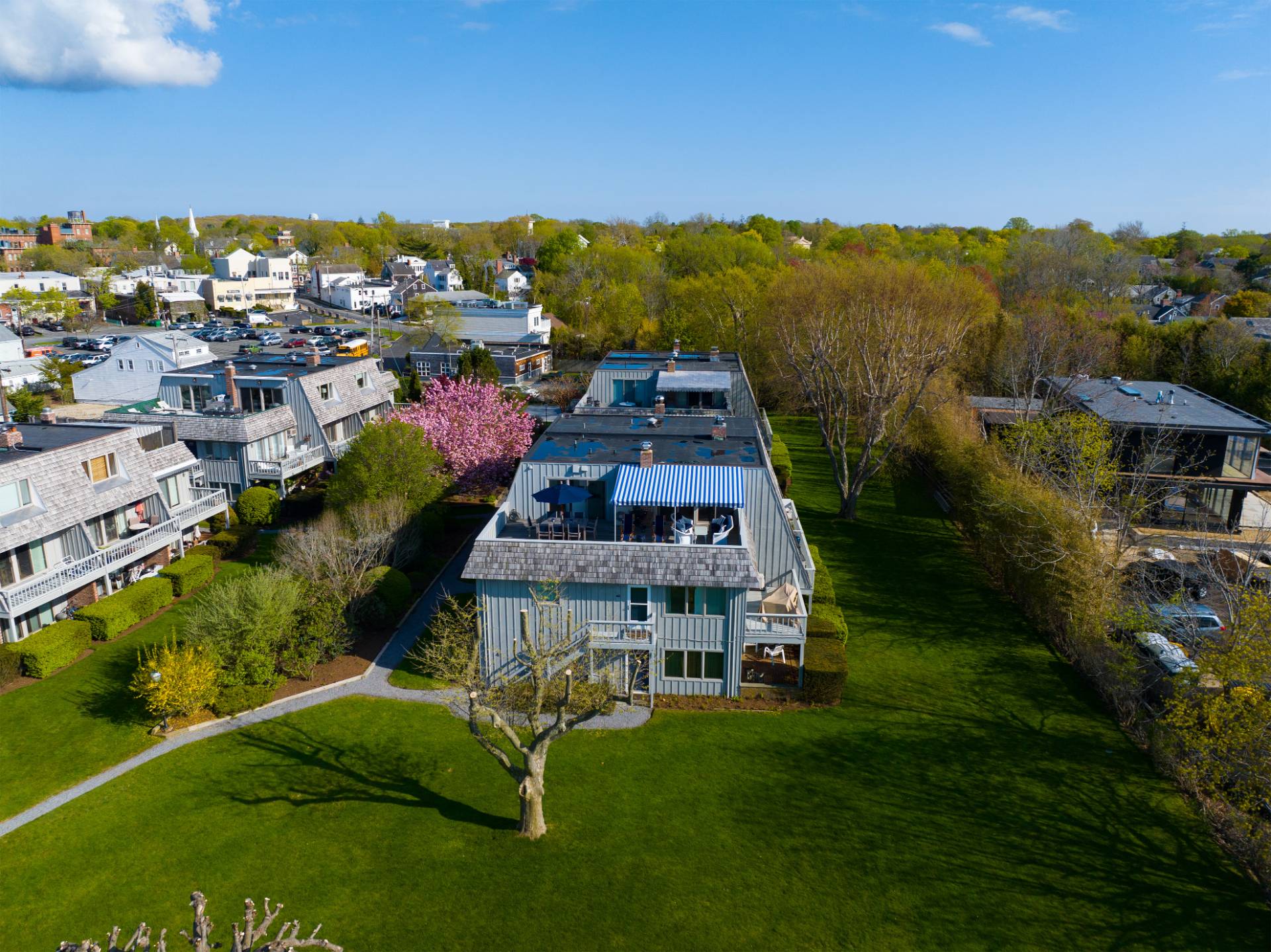 18 Bridge Street, Unit 4D Sag Harbor, NY 11963 - Photo 3 of 16 a view of a city with lawn chairs