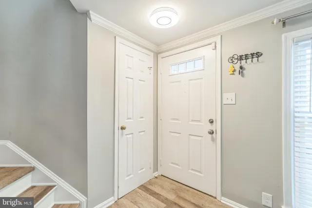 a view of a bathroom with wooden floor