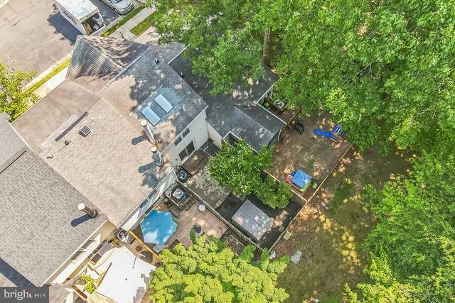 an aerial view of residential house with outdoor space